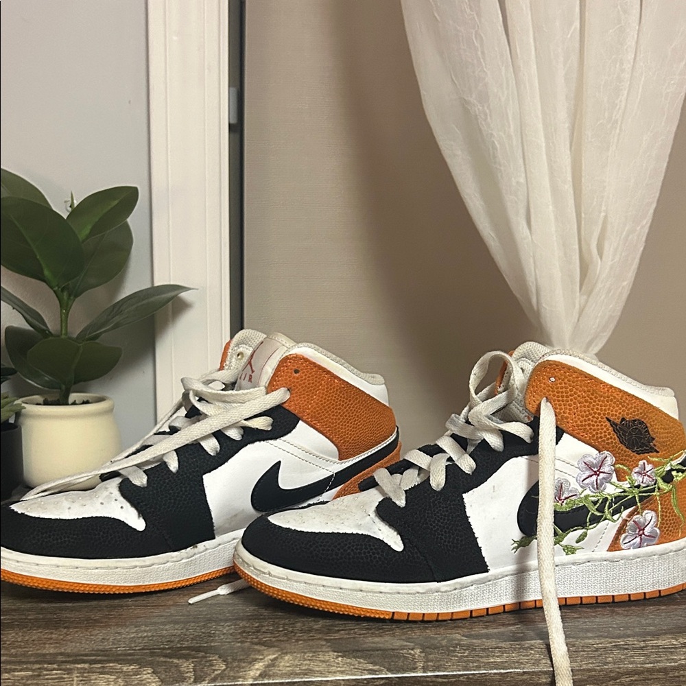 Nike Kids' Black, White, and Orange Floral Sneakers